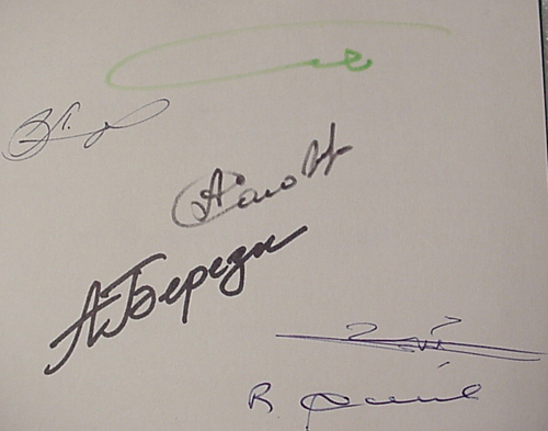  # cb208            USSR-Syria Soyuz TM-3/MIR flown and back up cosmonauts signed book. 2