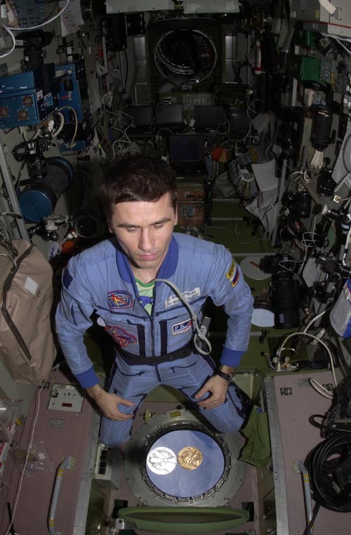  # ma350            Medals and Pins flown on ISS 4