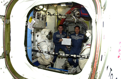  # ic085a            Greeting from Russia-USA team ISS-7 2