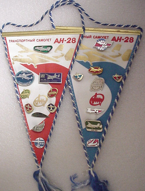  # avpnt114            Antonov-28 pennants with attached pin collection. 1