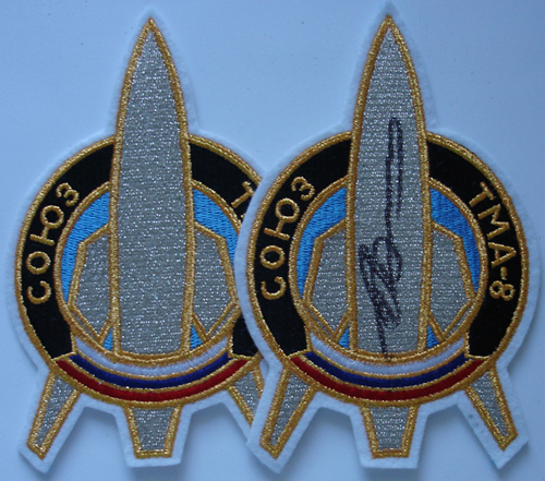  # spp089b            Soyuz TMA-8 patch for official photo 1